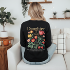 Back of the black Daughter of God long sleeve tee with the large floral design and 2 Corinthians 6:18