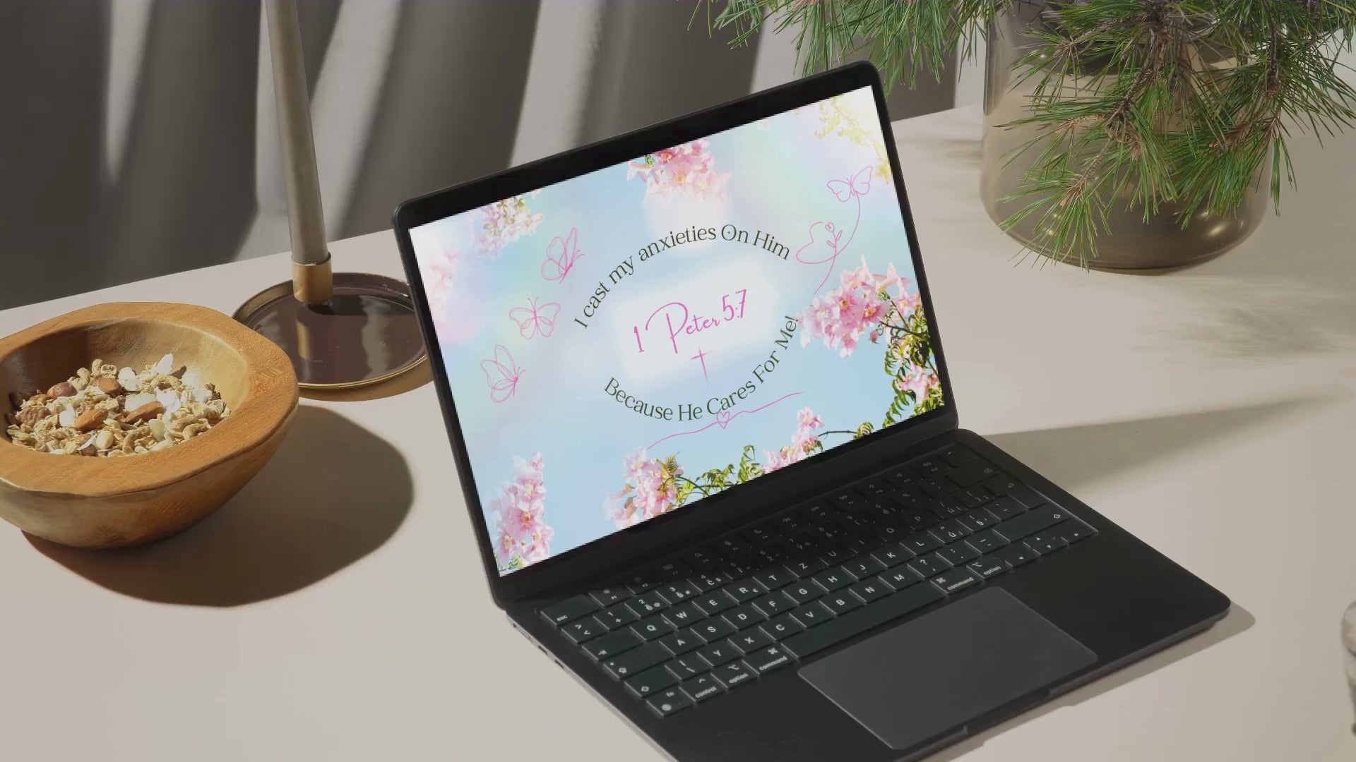 1 Peter 5:7; Christian Wallpaper displaying a motivational quote with floral design; I cast my anxieties on Him. 